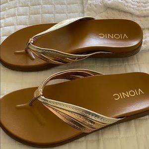 Vionic gold and bronze sandals.